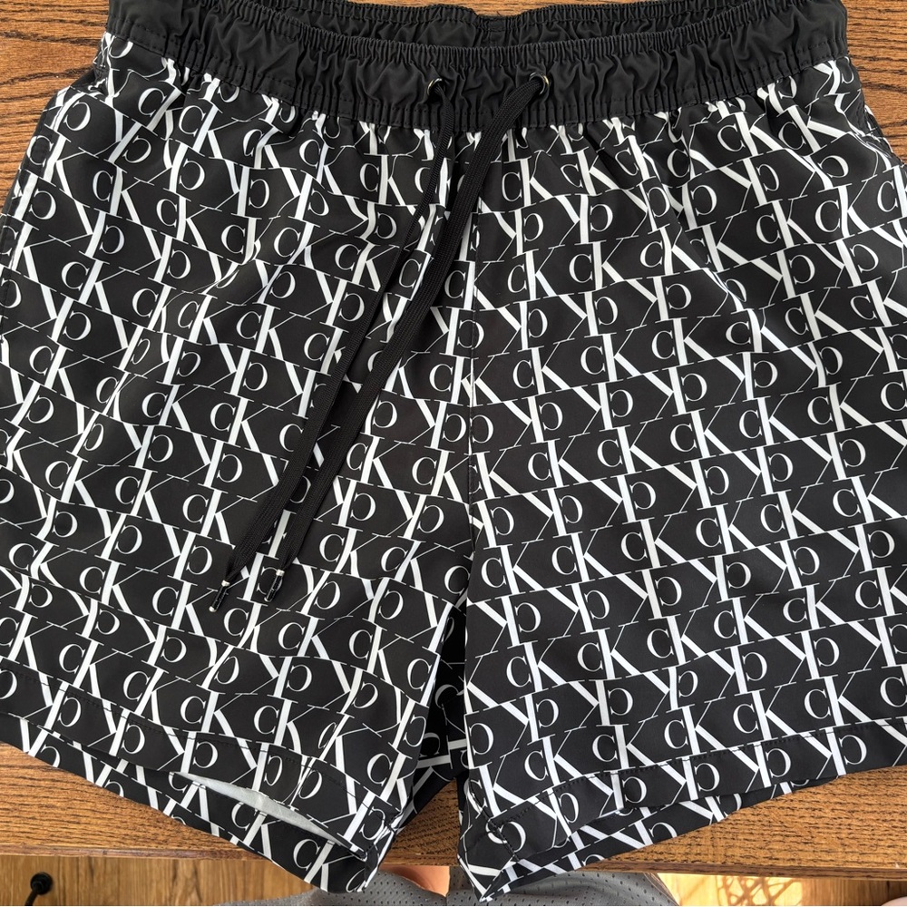 Calvin Klein Black and White Swim Trunks with Geometric Pattern